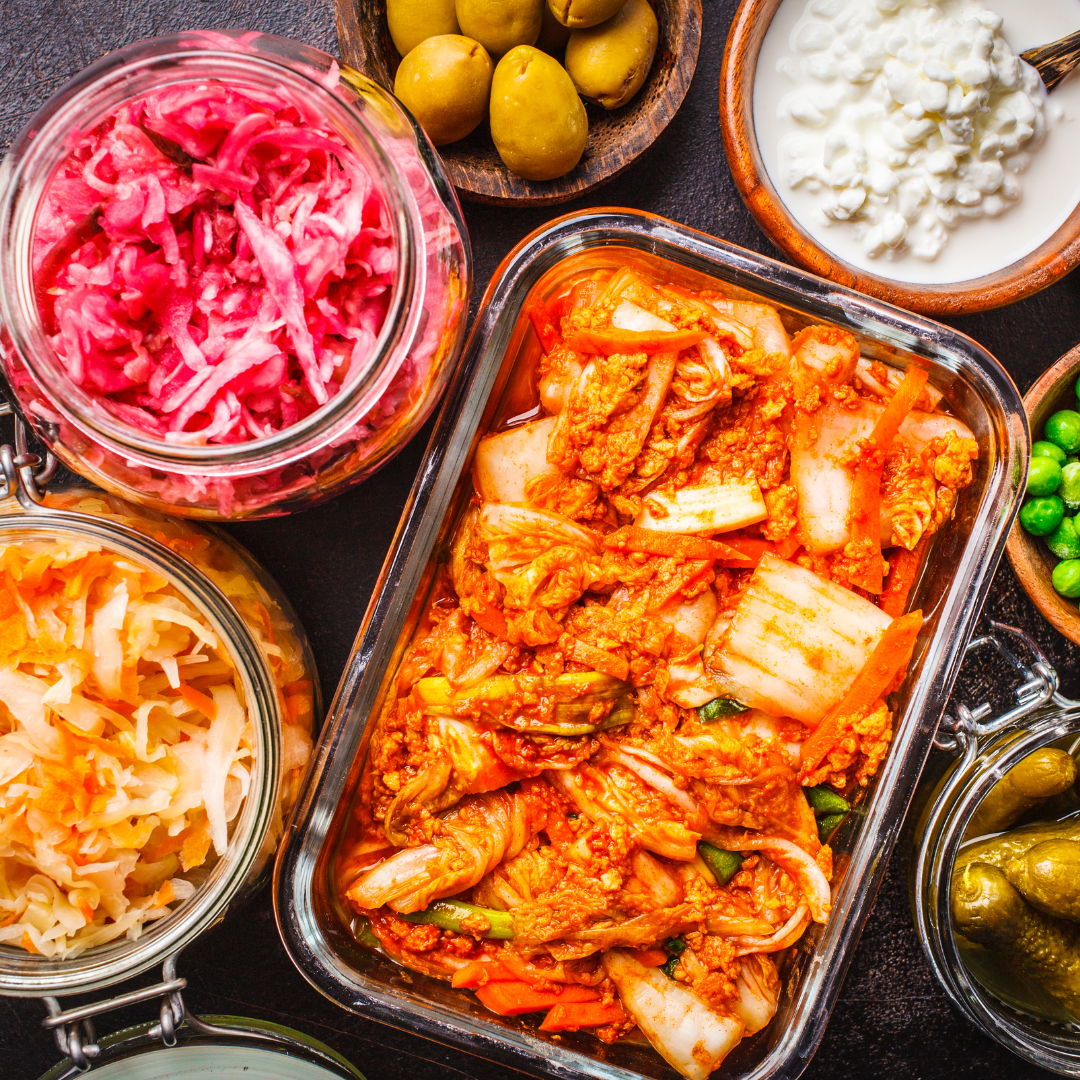 What is the difference between fermented foods and prebiotics?
